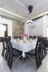 restaurant table with food and dishes in bright colors