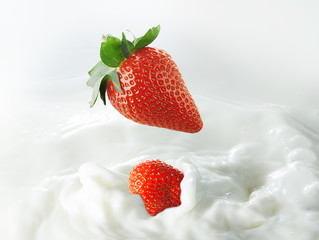 strawberries in milk splash