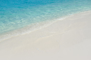 Fototapeta na wymiar White sand beach and turquoise sea water, Maldives