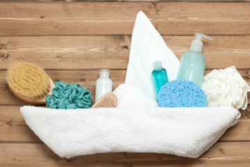 Obraz na płótnie Canvas Towel Ship. Shampoo, Soap Bar And Liquid. Shower Gel. Spa Kit. T