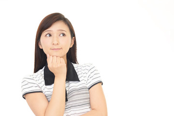 Fototapeta premium 考え事をする女性