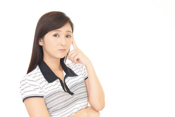 Fototapeta premium 悩む女性