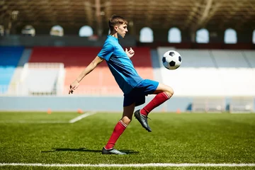 Zelfklevend Fotobehang Young football player © pressmaster