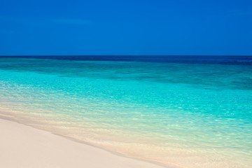 Fototapeta na wymiar Beautiful beach and tropical turquoise sea