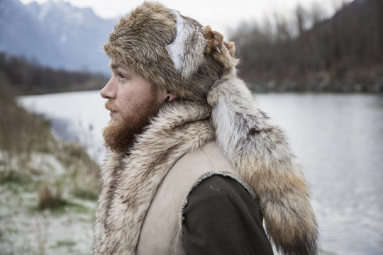Mid adult man wearing trapper hat, portrait