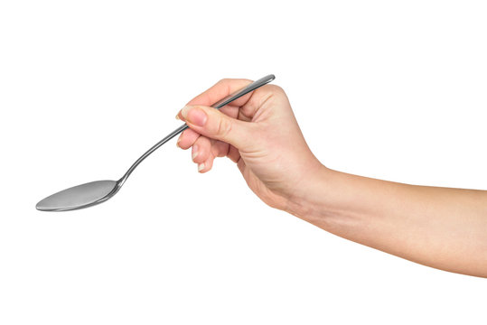 Hand Is Holding A Spoon Isolated On A White Background