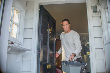Handyman leaving house