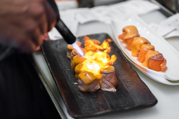 burning salmon sushi