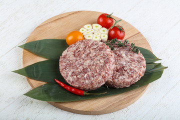 Raw burger cutlet