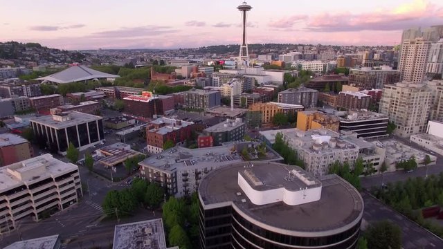 Seattle, WA 4-29-16: Aerial Fly Over Downtown City Buildings to Reveal Space Needle