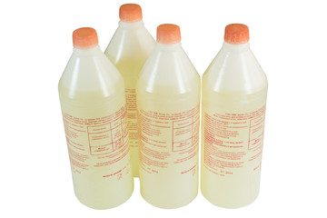 Four bottles of household chemicals. Isolated on white background.