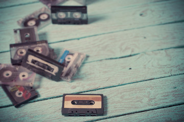 audio tapes on blue wooden background