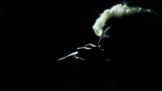 Slow motion of a woman smoking - filmed with 35mm camera! No noise, no aliasing, no banding etc.
