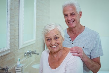 Portrait of senior couple in bathroom