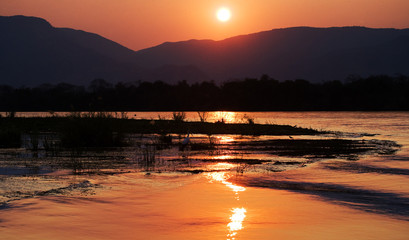 Sunset on the Zambezi River. Africa. Border of Zambia and Zimbabwe. 