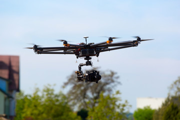 Fototapeta na wymiar Drone, Unmanned copter flight, pilot flying drone 