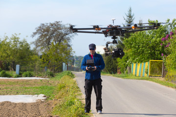 Drone, Unmanned copter flight, pilot  flying drone  © wip-studio