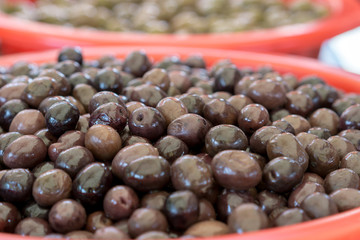 olives in bowl, pickled and marinated. on the market in Greece, kalamata olives, Greek traditional food, Greek food ingredients
