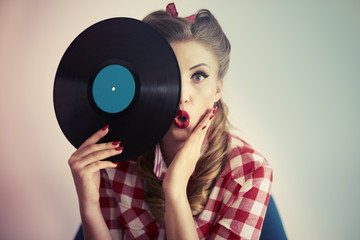 Face hidden behind the vinyl.