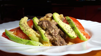 Meat with sauce and garnish 