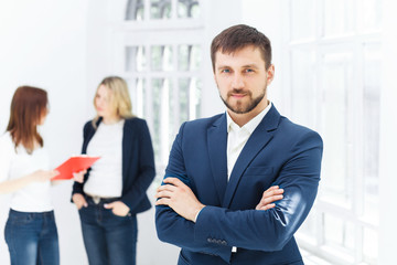 Male and female office workers.