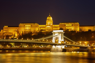 Naklejka na ściany i meble Cain Bridge illuminated at night, Budapest Hungary.