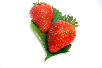 Strawberry with leaf isolated on white