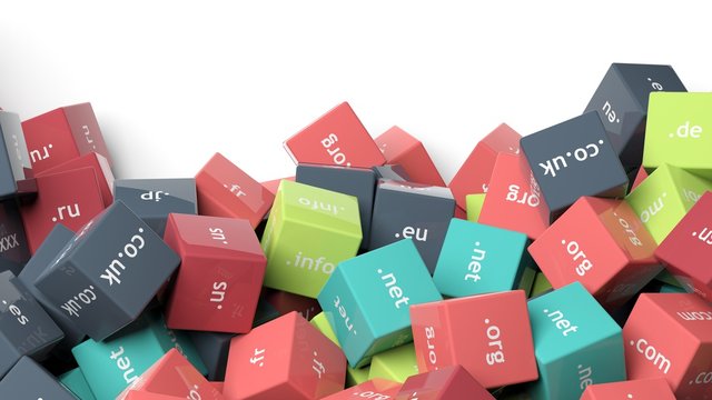3d rendering, colorful cubes with domain extensions, on white with copy-space