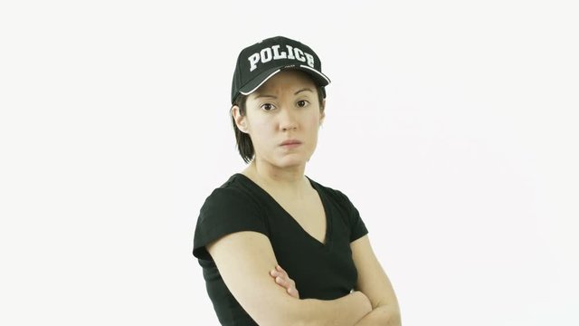 caucasian police woman isolated on white upset anger arms crossed