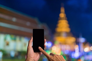 Take photo by smartphone Wat Phra That Hariphunchai, Lamphun Tha