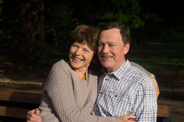 Happy senior couple in a park