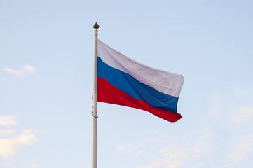 Fototapeta na wymiar Russian flag and blue sky