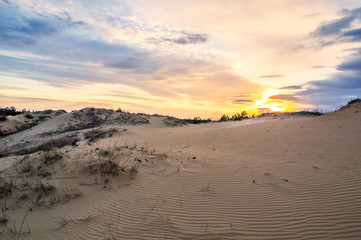Fototapeta na wymiar Beautiful sunset at the sand quarry, sand