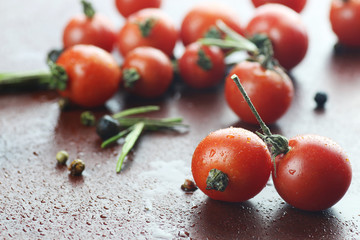 Water drops green and tomatoes