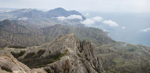 Fototapeta na wymiar mystical misty mountain landscape rocky peak