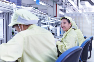 Quality check station at factory producing flexible electronic circuit boards. Plant is located in the south of China, in Zhuhai, Guangdong province
