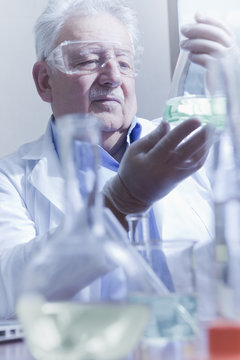 Senior scientist working at laboratory