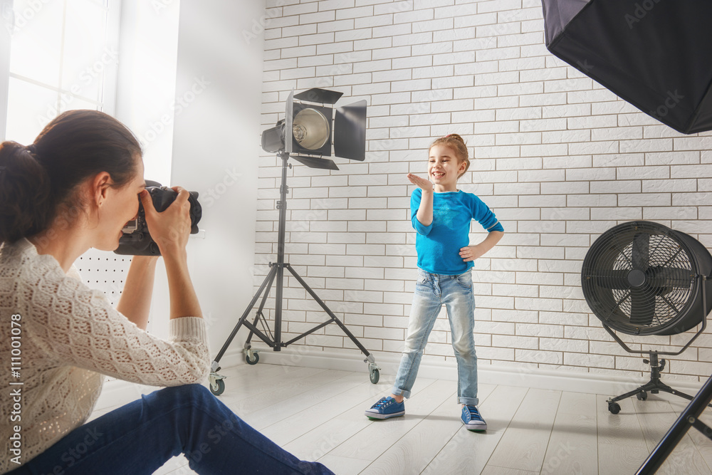 Wall mural Photographer in motion.