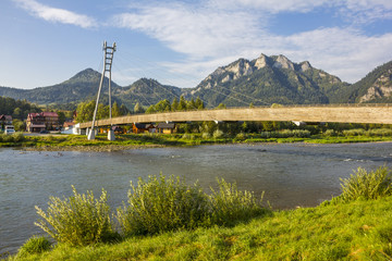 Fototapeta premium Footbridge over the river Dunajec, Poland/Slovakia