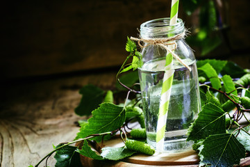 Traditional Russian refreshing drink birch juice in a small bott