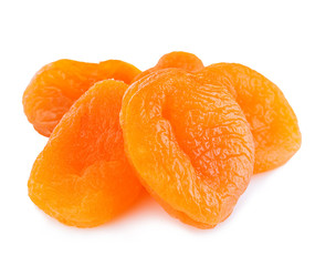 Dried apricots close-up on a white background.