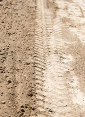 a trace of the machine on the ground as a background