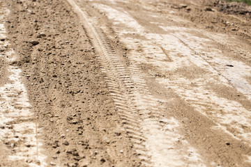 a trace of the machine on the ground as a background