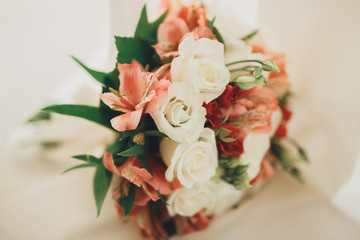Wonderful luxury wedding bouquet of different flowers