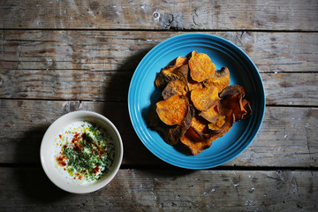 Sweet potato chips, baked, with yogurt and cucumber dip, tzatziki