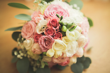 Wonderful luxury wedding bouquet of different flowers