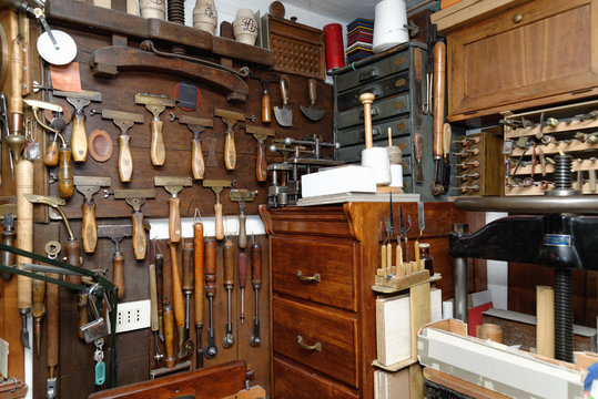 Selection of tools and equipment in traditional bookbinding workshop