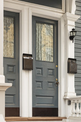 Obraz premium Front door, gray with white trim