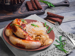 Sauerkraut with fried Munich sausages