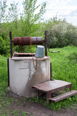 old well with water in the village